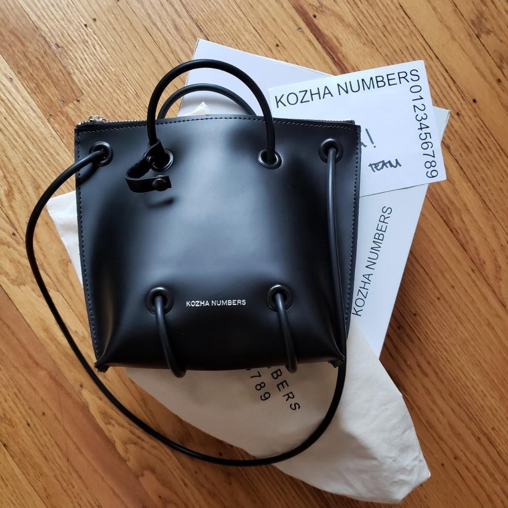 Kozha Numbers Zipper Utility Bag in black